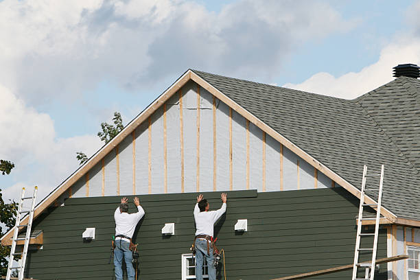 Professional Siding Installation technician working in Ellicott City, MD
